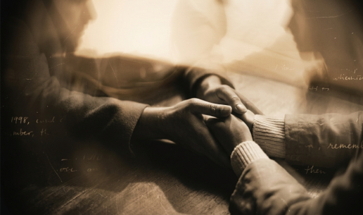 couple with relationship issues holding hands in counseling session